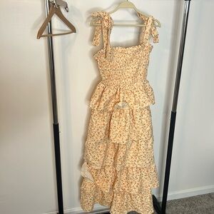 - Tiered sleeveless floral maxi dress